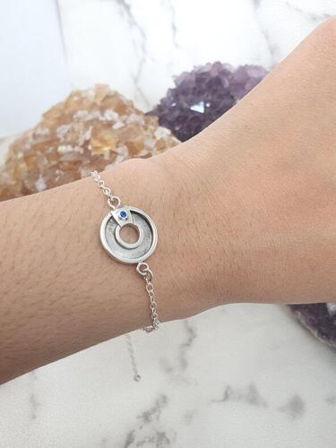 bracelet with a pendant that can hold ashes