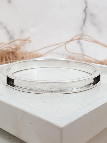 armring der kan indeholde hestehår, pels eller aske