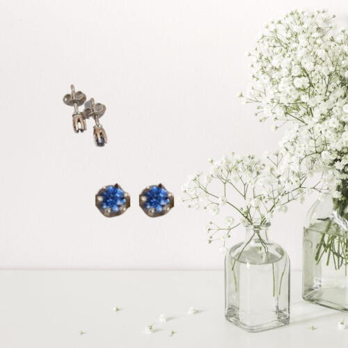 Earrings with blue zircons